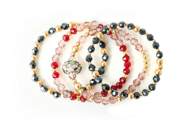 The Erdan Bracelet Stack of Four in Pink, Red, Black and Gold with Grey Swarovski Crystal Charm